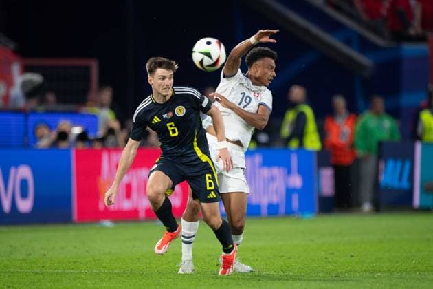 Kieran TIERNEY SCO vs NDOYE Dan SUI Action, Duel, Group Stage Group A Scotland SCO Switzerland SUI 1 1 on 19 06 2024 Stadion Koeln, Cologne Stadium, Football UEFA EURO 2024 GERMANY from 14 06 2024 14 07 2024 Â