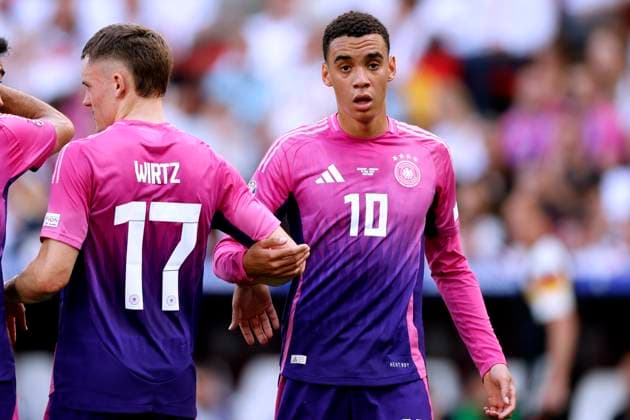 MUSIALA Jamal Team Germany with WIRTZ Florian at a wall UEFA European Football Championship 2024 in Germany Match Germany Hungary 2 0 on 19 06 2024 in Stuttgart DFL REGULATIONS PROHIBIT ANY USE OF PHOTOGRAPHS as IMAGE SEQUENCES and or QUASI VIDEO Copyright: xLacixPerenyix