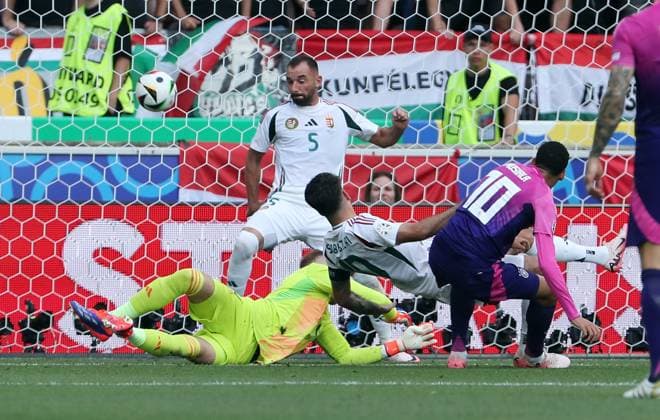 Jamal Musiala scores the 1-0 goal against goalkeeper Peter Gulacsi, Attila Fiola, Dominik Szoboszlai duel Match scene Action Sport Football Soccer European Football Championship Euro 2024 European Championship Men Season 2023 2024 19 06 2024 Germany GER vs Hungary HUN in Stuttgart DFL regulations prohibit any use of photographs as image sequences and or quasi video