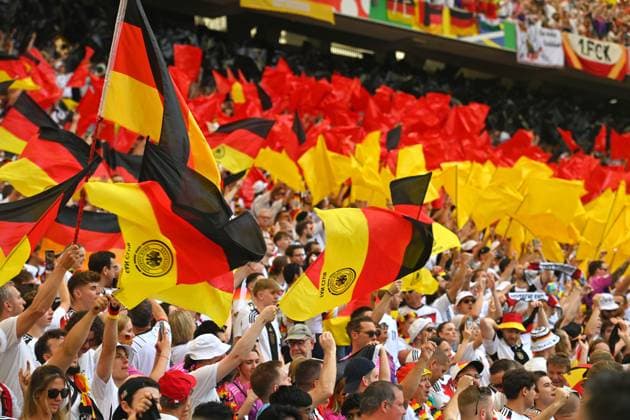 German fans,football fans waving black red gold flags,flags tribute,fan block group stage group A Germany GER Hungary HUN 2 0 on 19 06 2024, Stuttgart Arena football UEFA EURO 2024 GERMANY from 14 06 2024 14 07 2024