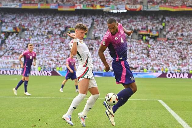 Jonathan Tah GER , action,duel against Milos KERKEZ HUN group stage group A Germany GER Hungary HUN 2 0 on 19 06 2024, Stuttgart Arena Football UEFA EURO 2024 GERMANY from 14 06 2024 14 07 2024