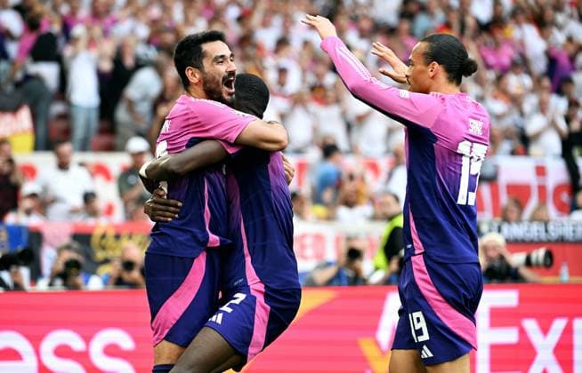 Football, European Championship, EURO 2024, Group A, MHP Arena Stuttgart Germany Hungary 2 0 Cheering Ilkay Gündogan GER after his goal for 2 0, together with Leroy Sane GER , Antonio Rüdiger GER Cheering, joy, action