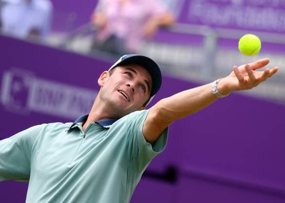 Sport Bilder des Tages 20th June 2024; Cinch Championships, Queens Club, West Kensington, London, England: Cinch Championships Queens Club, Day 4; Tommy PAUL (USA) serves to Alejandro TABILO (CHI), mens singles match  ActionPlus12657167 JohnxPatrickxFletcher