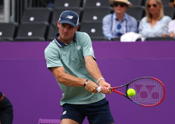 20th June 2024; Cinch Championships, Queens Club, West Kensington, London, England: Cinch Championships Queens Club, Day 4; Tommy PAUL (USA) with a backhand shot to Alejandro TABILO (CHI), mens singles match  ActionPlus12657174 JohnxPatrickxFletcher