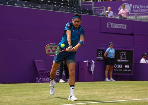 20th June 2024; Cinch Championships, Queens Club, West Kensington, London, England: Cinch Championships Queens Club, Day 4; Alejandro TABILO (CHI) with a backhand shot to Tommy PAUL (USA), mens singles match  ActionPlus12657181 JohnxPatrickxFletcher