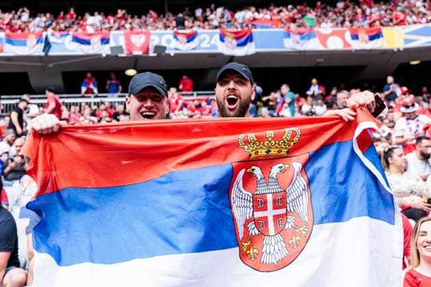 UEFA EURO 2024 Slovenia Serbia 20 06 2024 Fans of Serbia with flags UEFA EURO 2024 Slovenia Serbia Munich Football Arena, Munich on 20 06 2024 Copyright: xBEAUTIFULxSPORTS Wunderlx