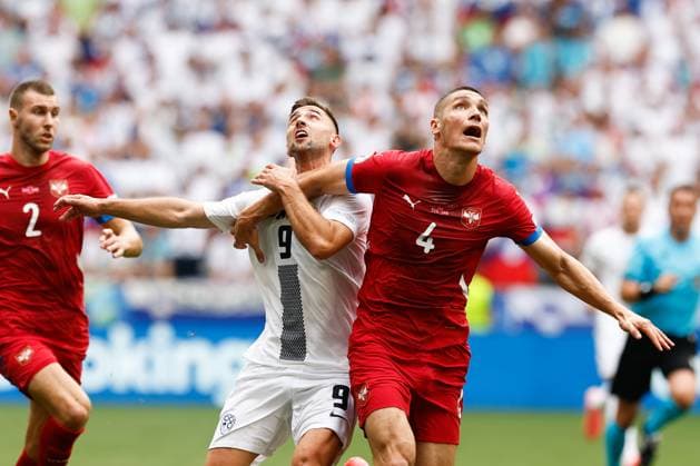 MUNCHEN, 20-06-2024, Allianz Arena. European Football Championship Euro2024, Group stage match no.18 between Slovenia and Serbia, Slovenia player Andrez Sporar, Serbia player Nikola Milenkovic Slovenia - Serbia (Euro2024)  x25540748x Copyright: