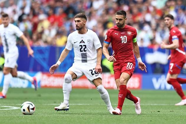 Adam Gnezda Cerin of Slovenia and Dusan Tadic of Serbia Slovenia v Serbia, UEFA European Championship, EM, Europameisterschaft 2024, Group C, Football, Munich Football Arena, Munich, Germany, 20 Jun 2024 EDITORIAL USE ONLY No use with unauthorised audio, video, data, fixture lists, club league logos or live services. Online in-match use limited to 120 images, no video emulation. No use in betting, games or single club league player publications. Copyright: xMichaelxZemanek Shutterstockx 14543659ap