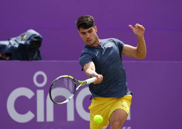 20th June 2024; Cinch Championships, Queens Club, West Kensington, London, England: Cinch Championships Queens Club, Day 4; Carlos Alcaraz (ESP) with a forehand shot to Jack Draper (GBR), mens singles match  ActionPlus12657198 JohnxPatrickxFletcher