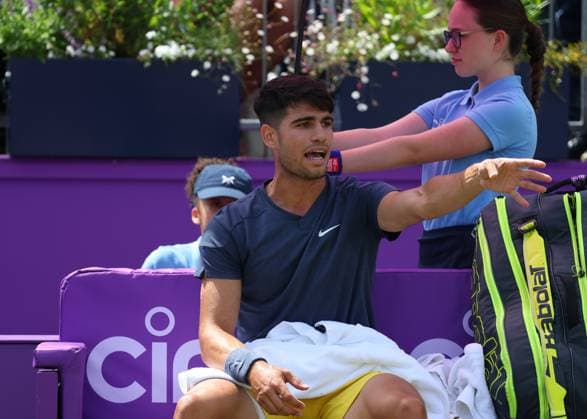 20th June 2024; Cinch Championships, Queens Club, West Kensington, London, England: Cinch Championships Queens Club, Day 4; Carlos Alcaraz (ESP) complaining to Umpire Mohamed Lahyani (SWE) about the ball kids on Centre Court during a break in the first set against Jack Draper (GBR), mens singles match  ActionPlus12657207 JohnxPatrickxFletcher