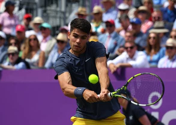 20th June 2024; Cinch Championships, Queens Club, West Kensington, London, England: Cinch Championships Queens Club, Day 4; Carlos Alcaraz (ESP) with a backhand shot to Jack Draper (GBR), mens singles match  ActionPlus12657212 JohnxPatrickxFletcher
