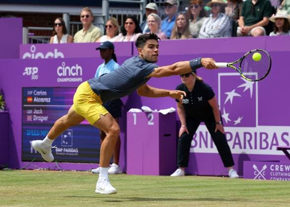 20th June 2024; Cinch Championships, Queens Club, West Kensington, London, England: Cinch Championships Queens Club, Day 4; Carlos Alcaraz (ESP) with a backhand shot to Jack Draper (GBR), mens singles match  ActionPlus12657213 JohnxPatrickxFletcher