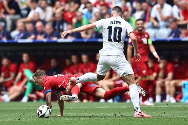 Ivan Ilic of Serbia fouled by Timi Elsnik of Slovenia Slovenia v Serbia, UEFA European Championship, EM, Europameisterschaft 2024, Group C, Football, Munich Football Arena, Munich, Germany, 20 Jun 2024 EDITORIAL USE ONLY No use with unauthorised audio, video, data, fixture lists, club league logos or live services. Online in-match use limited to 120 images, no video emulation. No use in betting, games or single club league player publications. Copyright: xMichaelxZemanek Shutterstockx 14543659au