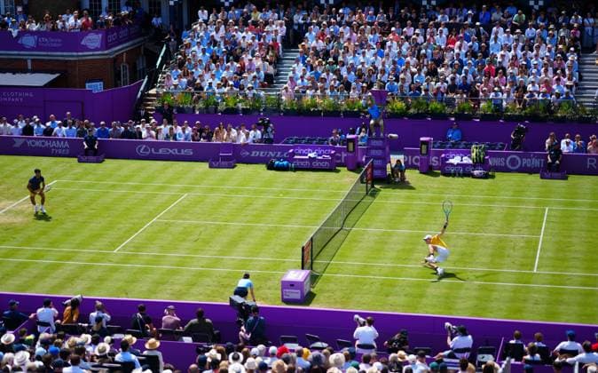 Jack Draper slips over returning to Carlos Alcaraz during their second round match Cinch Championships, Day 4, Tennis, Queen s Club, London, UK - 20 June 2024  Copyright: xJavierxGarcia Shutterstockx 14543333k