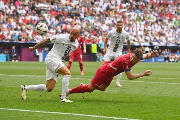 Goal chance Dusan VLAHOVIC SRB , action,duel against Vanja DRKUSIC SVN group phase group C Slovenia SVN Serbia SRB on 20 06 2024, Football Arena Munich Football UEFA EURO 2024 GERMANY from 14 06 2024 14 07 2024