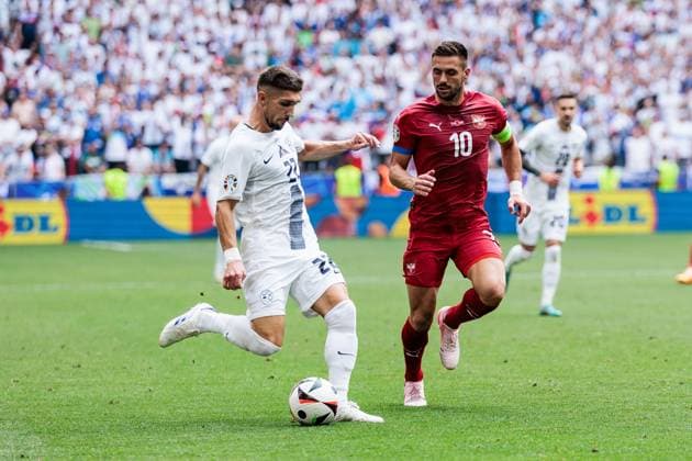 UEFA EURO 2024 Slovenia Serbia 20 06 2024 duel Adam Gnezda Cerin Slovenia, 22 , Dusan Tadic Serbia, 10 UEFA EURO 2024 Slovenia Serbia Munich Football Arena, Munich on 20 06 2024 Copyright: xBEAUTIFULxSPORTS Wunderlx