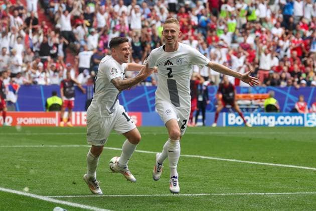 Goal celebration by Erik Janza 13 Slovenia , Zan Karnicnik 2 Slovenia to 1 0, Slovenia vs Serbia Football, UEFA Euro 2024, Group stage, Matchday 2, 20 06 2024 Munich Bavaria Germany Copyright: xkolbert-press ChristianxKolbertx