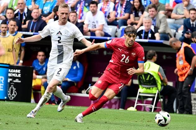 Munich, Germany, June 20st 2024: Veljko Birmancevic of Serbia (R) in action against Zan Karnicnik of Slovenia (L) during the UEFA EURO, EM, Europameisterschaft,Fussball 2024 football match between Slovenia and Serbia at Munich Football Arena, Munich, Germany. (Igor Kupljenik SPP)  Copyright: xIgorxKupljenikx xSPPx spp-en-IgKuSp-IKO_0970
