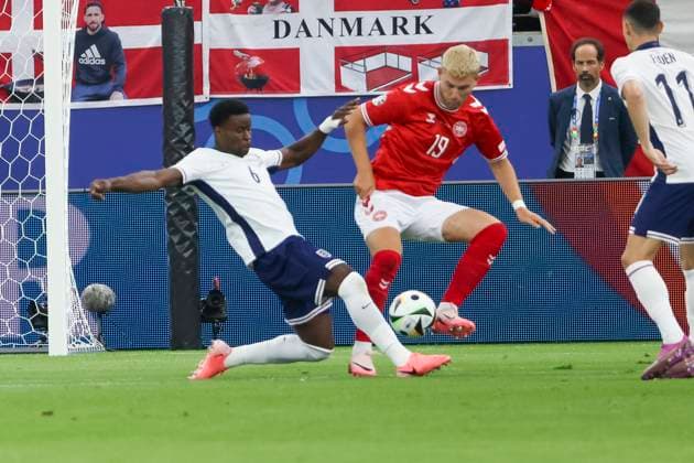 Marc Guehi England, 06 and Jonas Wind Denmark, 19 in duel , Football, UEFA , European Championship, Group C 2024, Denmark vs England, 20 06 2024, Frankfurt Arena, Frankfurt, Germany Frankfurt Frankfurt Arena Hessen Germany Copyright: xGrantxHubbsx
