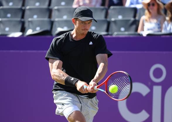 20th June 2024; Cinch Championships, Queens Club, West Kensington, London, England: Cinch Championships Queens Club, Day 4; Billy Harris (GBR) with a backhand shot to Giovanni Mpetshi Perricard (FRA), mens singles match  ActionPlus12657386 JohnxPatrickxFletcher