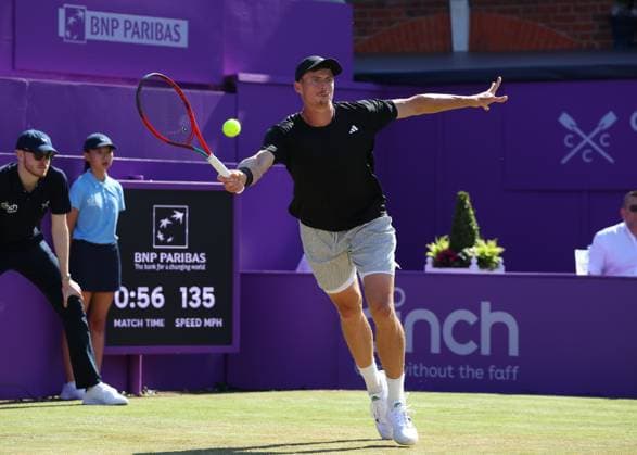 20th June 2024; Cinch Championships, Queens Club, West Kensington, London, England: Cinch Championships Queens Club, Day 4; Billy Harris (GBR) with a forehand shot to Giovanni Mpetshi Perricard (FRA), mens singles match  ActionPlus12657389 JohnxPatrickxFletcher