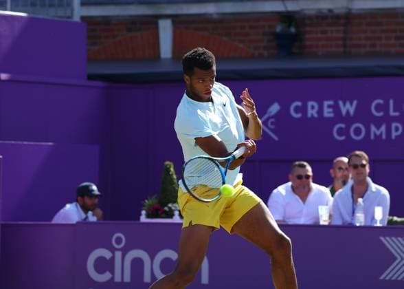 20th June 2024; Cinch Championships, Queens Club, West Kensington, London, England: Cinch Championships Queens Club, Day 4; Mpetshi Perricard (FRA) with a forehand shot to Billy Harris (GBR), mens singles match  ActionPlus12657394 JohnxPatrickxFletcher