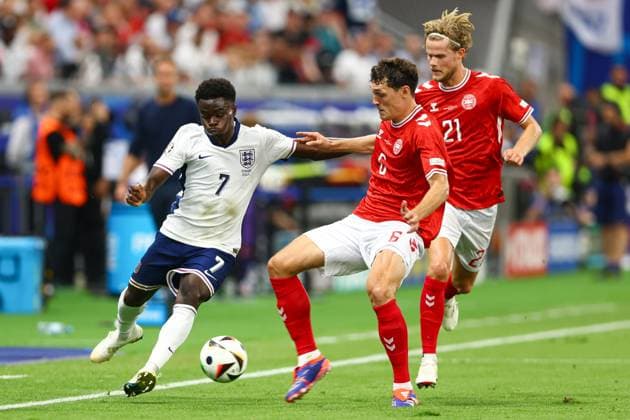 Bukayo Saka of England (L) under pressure from Andreas Christensen of Denmark (R) Denmark v England, UEFA European Championship, EM, Europameisterschaft 2024, Group C, Football, Frankfurt Arena, Frankfurt, Germany, 20 Jun 2024 EDITORIAL USE ONLY No use with unauthorised audio, video, data, fixture lists, club league logos or live services. Online in-match use limited to 120 images, no video emulation. No use in betting, games or single club league player publications. Copyright: xKieranxMcManus Shutterstockx 14543690bk