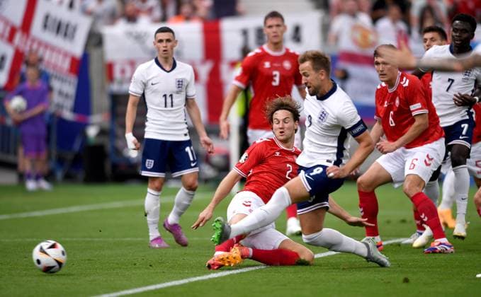 Soccer Euro 2024 Group C 20 06 2024 Denmark England GOAL for 0 1 by goal scorer Harry Kane right, England against Joachim Andersen left, Denmark