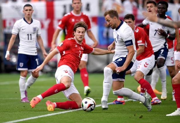 Soccer Euro 2024 Group C 20 06 2024 Denmark England GOAL for 0 1 by goal scorer Harry Kane right, England against Joachim Andersen left, Denmark
