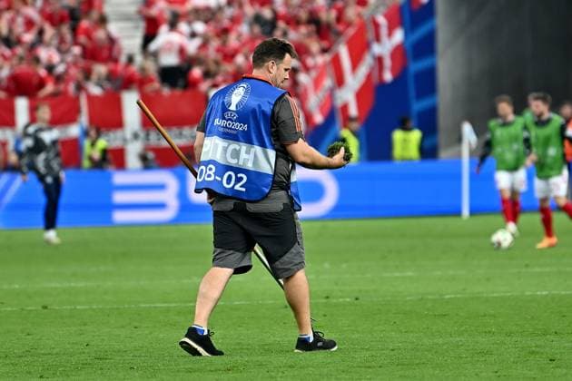 20 06 2024, xscotx, European Football Championship 2024, Denmark England, emspor, v l Greenkeeper takes care of the damaged turf Frankfurt am Main