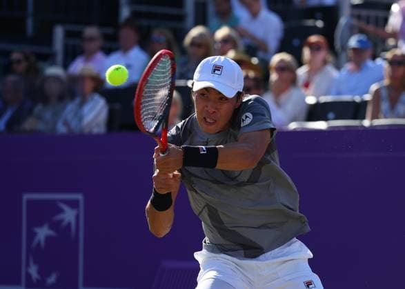 20th June 2024; Cinch Championships, Queens Club, West Kensington, London, England: Cinch Championships Queens Club, Day 4; Brandon Nakashima (USA) with a backhand shot to Lorenzo Musetti (ITA), mens singles match  ActionPlus12657503 JohnxPatrickxFletcher