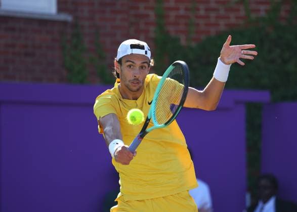 20th June 2024; Cinch Championships, Queens Club, West Kensington, London, England: Cinch Championships Queens Club, Day 4; Lorenzo Musetti (ITA) with a backhand shot to Brandon Nakashima (USA), mens singles match  ActionPlus12657486 JohnxPatrickxFletcher
