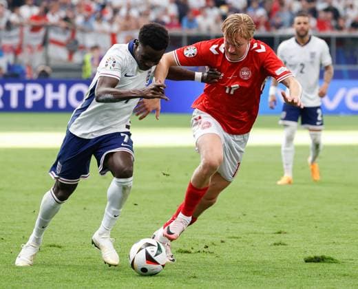 In the picture from left Bukayo Saka England, 7 against Victor Kristiansen Denmark, 17 20 06 2024, Denmark vs England, European Championship 2024, 2 Matchday, Germany, Frankfurt am Main, Deutsche Bank Park, DFL REGULATIONS PROHIBIT ANY USE OF PHOTOGRAPHS AS IMAGE SEQUENCES AND OR QUASI VIDEO Copyright: HMBxMedia xJulienxBecker