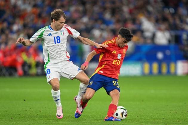 European Championship 2024 Spain Italy on 20 06 2024 in the Veltins Arena in Gelsenkirchen Nicolo Barella ITA and Pedri ESP MT