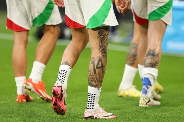 Tattoo on the leg of Gianluca Scamacca of Italy during the pre-match warm up Spain v Italy, UEFA European Championship, EM, Europameisterschaft 2024, Group B, Football, Arena AufSchalke, Gelsenkirchen, Germany, 20 Jun 2024 EDITORIAL USE ONLY No use with unauthorised audio, video, data, fixture lists, club league logos or live services. Online in-match use limited to 120 images, no video emulation. No use in betting, games or single club league player publications. Copyright: xPaulxCurrie Shutterstockx 14543734at