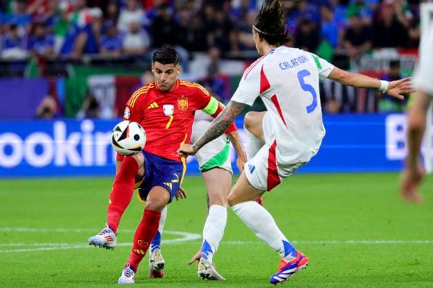 Alvaro Morata of Spain and Riccardo Calafiori of Italy compete for the ball during the Euro 2024 Group Stage B football match between Spain and Italy at Arena AufSchalke Stadium in Gelsenkirchen (Germany), June 20th, 2024. cesarexpurini