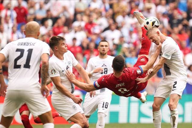 Sport Themen der Woche KW25 Sport Bilder des Tages June 20, 2024, Munich, Germany: Luka Jovic (2nd R) of Serbia, Vanja Drkusic (L), Jaka Bijol (2nd L) and Zan Karnicnik (R) of Slovenia seen in action during the UEFA EURO, EM, Europameisterschaft,Fussball 2024 group stage match between Slovenia and Serbia at Munich Football Arena. Munich Germany - ZUMAs197 20240620_aaa_s197_252 Copyright: xSergeixMikhailichenkox