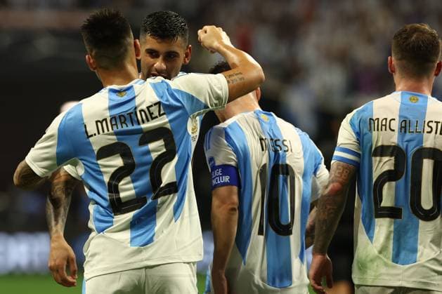 Argentina s forward Lautaro Martinez L celebrates with his teammate Argentina s defender Cristian Romero 2nd L after scoring the team™s second goal against Canada during the Copa America USA 2024, group A, group stage match between Argentina and Canada, at Mercedes Benz stadium in Atlanta, on June 20, 2024 ATLANTA UNITED STATES Copyright: xALEJANDROxPAGNIx