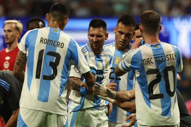 Argentina s forward Lionel Messi C is helped by teammates during the Copa America USA 2024, group A, group stage match between Argentina and Canada, at Mercedes Benz stadium in Atlanta, on June 20, 2024 ATLANTA UNITED STATES Copyright: xALEJANDROxPAGNIx