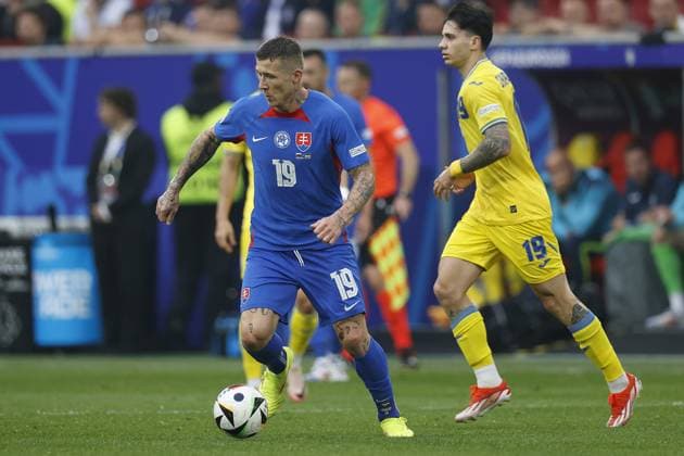 DUSSELDORF, Dusseldorf Arena , 21-06-2024 , European Football Championship Euro2024, Group stage match no.21 between Slovakia and Ukraine, Slovakia player Juraj Kuco and Ukraine player Mykola Shaparenko Slovakia - Ukraine  x25551088x Copyright: