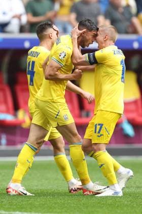 Roman Yaremchuk of Ukraine celebrates scoring his sides second goal with team-mate Oleksandr Zinchenko of Ukraine Slovakia v Ukraine, UEFA European Championship, EM, Europameisterschaft 2024, Group E, Football, Dusseldorf Arena, Dusseldorf, Germany - 21 Jun 2024 EDITORIAL USE ONLY No use with unauthorised audio, video, data, fixture lists, club league logos or live services. Online in-match use limited to 120 images, no video emulation. No use in betting, games or single club league player publications. Copyright: xPaulxCurrie Shutterstockx 14543871ca
