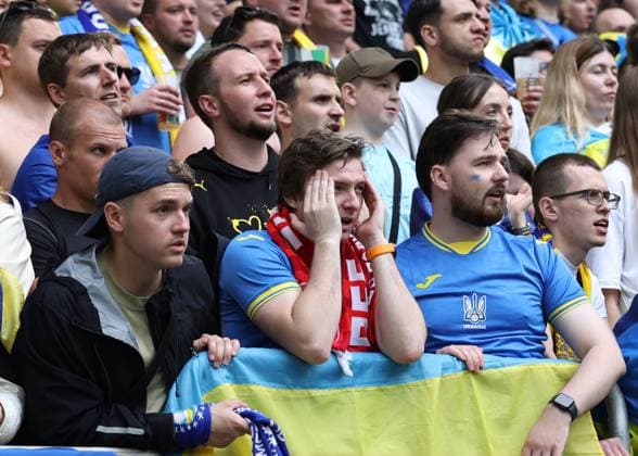 Dusseldorf, Germany, 21st June 2024. Tense times for Ukraine fans waiting for the final whistle during the UEFA European Championships match at Dusseldorf Arena, Dusseldorf. Picture credit should read: David Klein Sportimage EDITORIAL USE ONLY. No use with unauthorised audio, video, data, fixture lists, club league logos or live services. Online in-match use limited to 120 images, no video emulation. No use in betting, games or single club league player publications. SPI-3201-0081