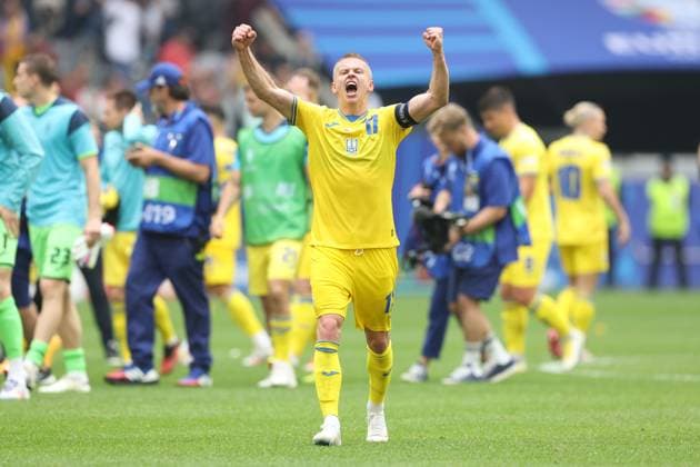 Oleksandr Zinchenko of Ukraine celebrates Ukraine winning the game Slovakia v Ukraine, UEFA European Championship, EM, Europameisterschaft 2024, Group E, Football, Dusseldorf Arena, Dusseldorf, Germany - 21 Jun 2024 EDITORIAL USE ONLY No use with unauthorised audio, video, data, fixture lists, club league logos or live services. Online in-match use limited to 120 images, no video emulation. No use in betting, games or single club league player publications. Copyright: xPaulxCurrie Shutterstockx 14543871co