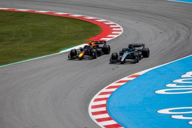 BARCELONA, SPAIN - JUNE 21: Sergio Perez (11) of Mexico and team Oracle Red Bull Racing and George Russell (63) of United Kingdom and team Mercedes-AMG Petronas F1 Team navigates the track during FP1 practice on Friday at the Spanish Grand Prix F1 on June 21, 2024 at the Circuit De Catalunya in Barcelona, Spain. (Photo by Bob Kupbens Icon Sportswire) AUTO: JUN 21 F1 Spanish Grand Prix EDITORIAL USE ONLY Icon240621067