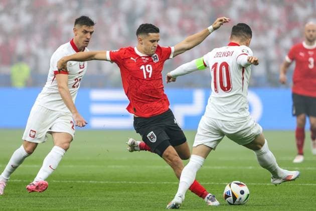 SOCCER - UEFA EURO, EM, Europameisterschaft,Fussball 2024 BERLIN,GERMANY,21.JUN.24 - UEFA EURO 2024, group stage, Austria vs Poland. Image shows Krzysztof Piatek (POL), Christoph Baumgartner (AUT) and Piotr Zielinski (POL).  GEPAxpictures xArminxRauthner