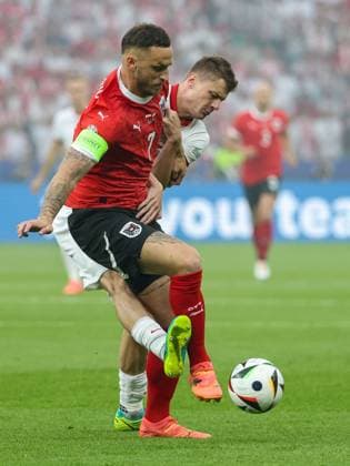 SOCCER - UEFA EURO, EM, Europameisterschaft,Fussball 2024 BERLIN,GERMANY,21.JUN.24 - UEFA EURO 2024, group stage, Austria vs Poland. Image shows Marko Arnautovic (AUT) and Pawel Dawidowicz (POL).  GEPAxpictures xArminxRauthner