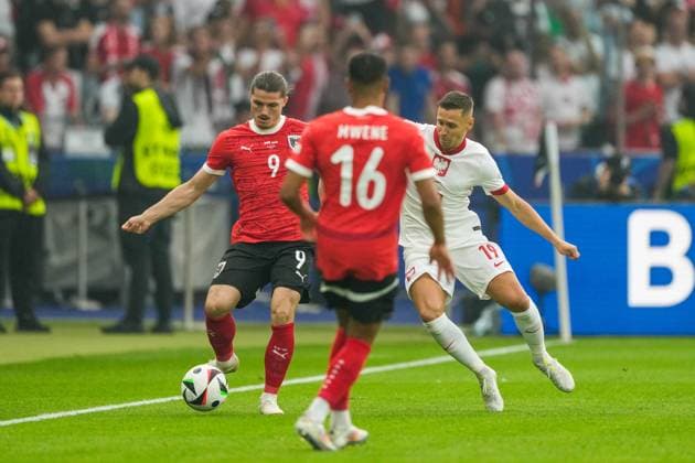 SOCCER - UEFA EURO, EM, Europameisterschaft,Fussball 2024 BERLIN,GERMANY,21.JUN.24 - UEFA EURO 2024, group stage, Austria vs Poland. Image shows Marcel Sabitzer (AUT) and Przemyslaw Frankowski (POL).  GEPAxpictures xJohannesxFriedl