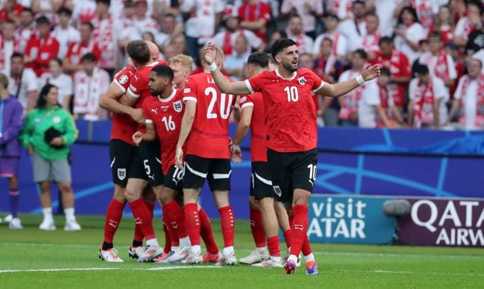 Gernot Trauner cheers after 0 1 with teammates, Phillipp Mwene, Konrad Laimer, Florian Grillitsch Joy Emotion Jubilation Sport Football Soccer European Championship Euro 2024 European Championship Men Season 2023 2024 21 06 2024 Poland POL vs Austria AUT in Berlin DFL regulations prohibit any use of photographs as image sequences and or quasi video