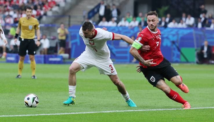 Pawel Dawidowicz in a duel with Marko Arnautovic Sport Football Soccer European Championship Euro 2024 European Championship Men Season 2023 2024 21 06 2024 Poland POL vs Austria AUT in Berlin DFL regulations prohibit any use of photographs as image sequences and or quasi video