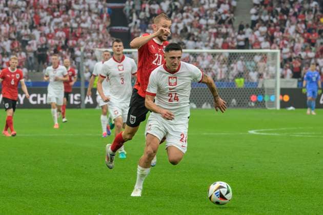 GER, Berlin, Football, Poland vs Austria, Group D, Group stage, UEFA EURO 2024, MD3, SP, Olympia Stadion Berlin, v l Konrad Laimer Austria , Bartosz Slisz Poland , duel, action, fight, fights for the ball, 21 06 2024, Copyright: HMBxMedia UwexKoch